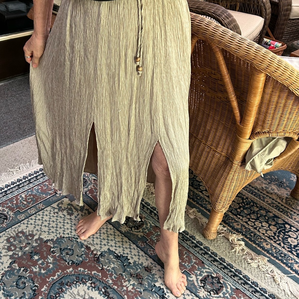 Midi length split skirt, L. Elastic, drawstring waist. Rayon/Acetate, wash cold.